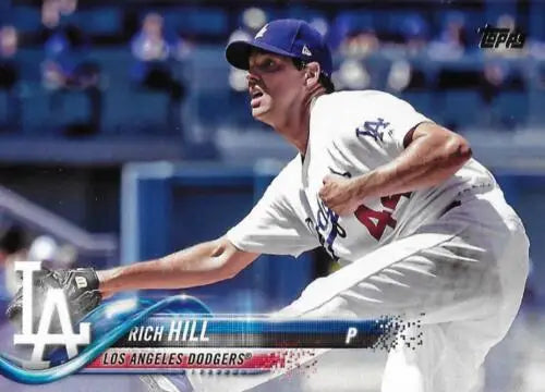 Baseball pitcher Rich Hill in white Dodgers uniform mid-delivery for 2018 Topps card