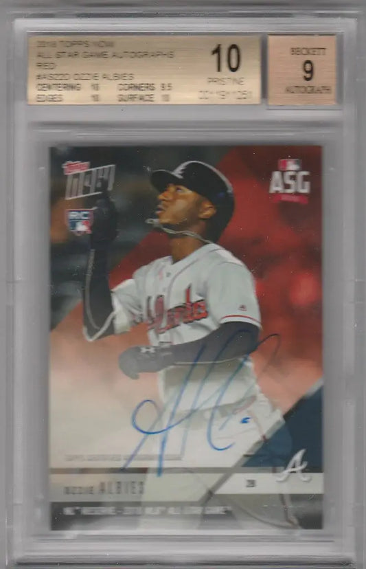 Graded Ozzie Albies baseball card in white uniform, showcasing pristine Atlanta Braves autograph
