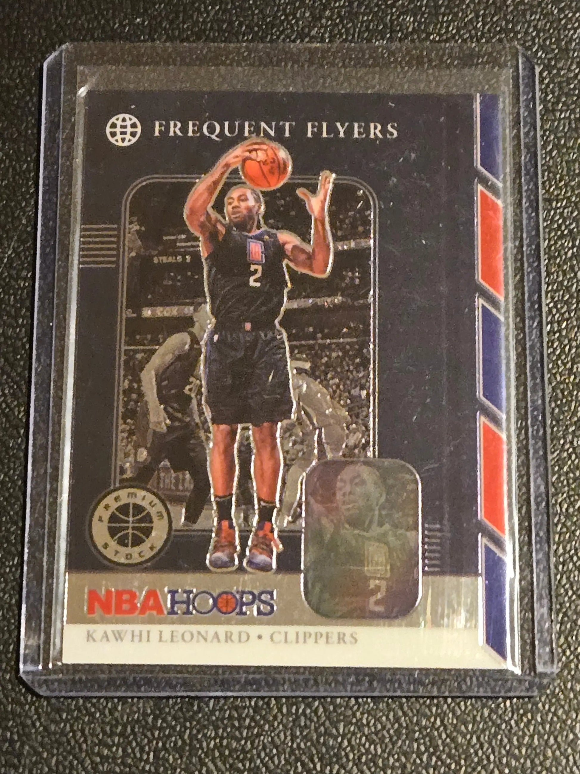 Kawhi Leonard NBA Hoops Premium Stock Frequent Flyers holographic trading card