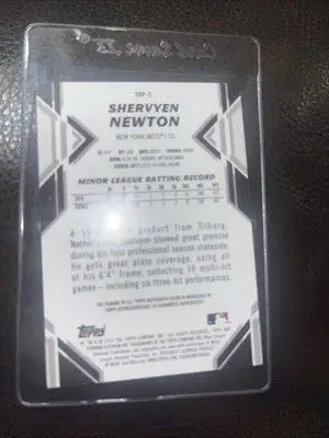 Baseball card in protective case featuring Bowman Platinum Shervyen Newton Mets Auto Red /10