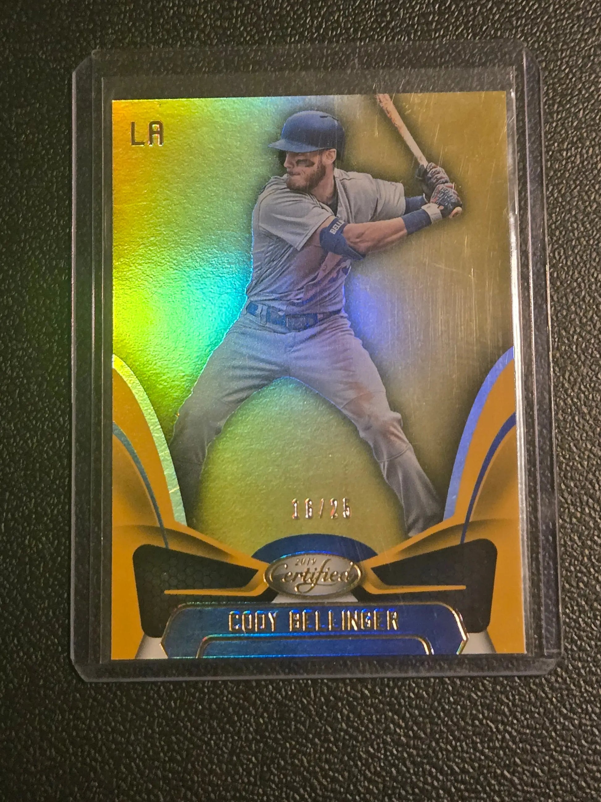 Cody Bellinger Certified Mirror Gold baseball card in protective sleeve, numbered 18/25