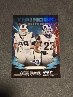 Football trading card featuring Aaron Donald and Marcus Peters from Panini Playoff 2019