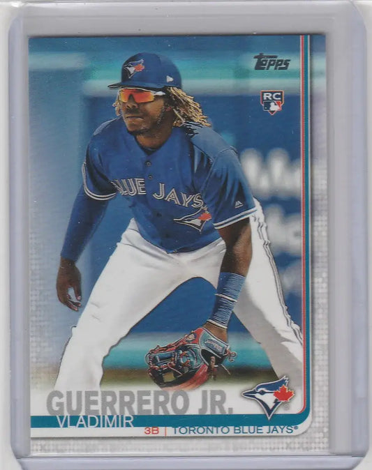 Baseball card of Vladimir Guerrero Toronto Blue Jays in fielding stance from Topps complete set