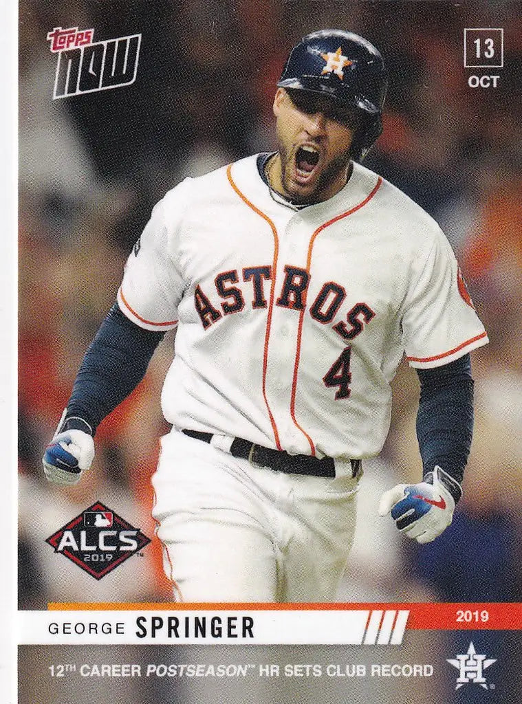 George Springer in Astros uniform celebrating 12th career postseason HR enthusiastically