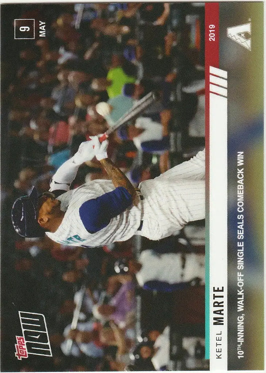 Ketel Marte swinging bat in white uniform during Diamondbacks 10th inning walk-off game