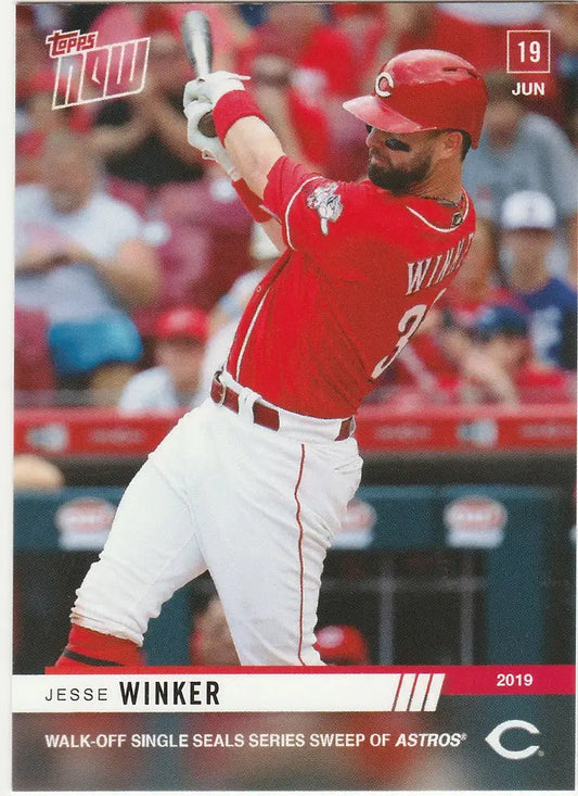 Baseball player Jesse Winker swinging a bat in red Cincinnati Reds uniform