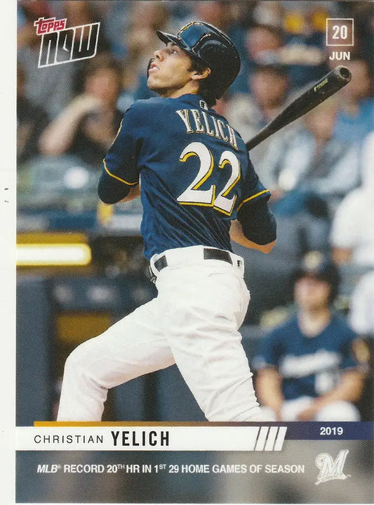 Baseball player Christian Yelich swinging bat in Milwaukee Brewers uniform 20th HR in 29 games