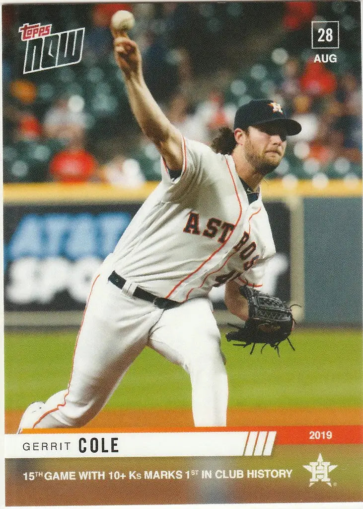 Baseball player in white Houston Astros uniform pitching ball, Gerrit Cole 15th game