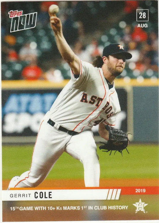 Baseball player in white Houston Astros uniform pitching ball, Gerrit Cole 15th game