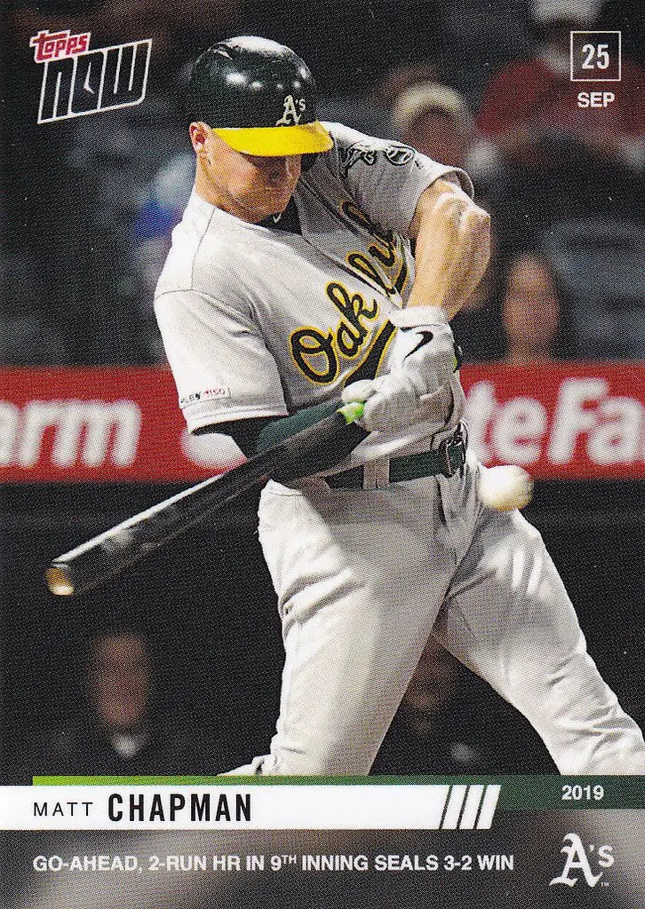 Baseball player in gray Oakland Athletics uniform swinging bat for Matt Chapman run hr Oakland