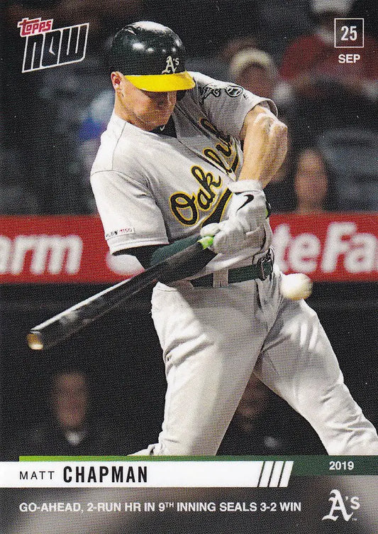 Baseball player in gray Oakland Athletics uniform swinging bat for Matt Chapman run hr Oakland