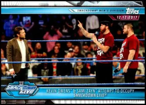 Wrestling match scene featuring Kevin Owens and Sami Zayn from 2019 Topps Road to WrestleMania