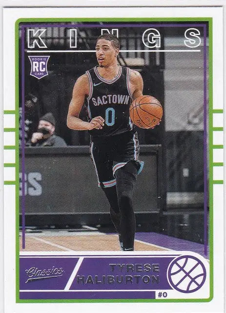 Basketball trading card of Tyrese Haliburton RC Sacramento in black jersey number 0