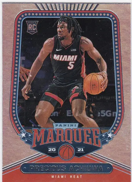 Basketball trading card of Precious Achiuwa RC Miami Heat in black jersey dribbling