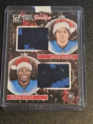 Football trading card featuring Justin Herbert and Joshua Kelley from 2020 Donruss Rookie Holiday Sweater