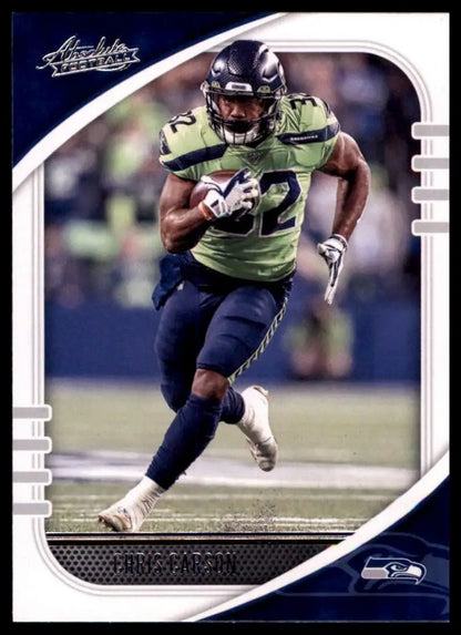 Football card featuring Chris Carson in green and blue uniform running with the ball