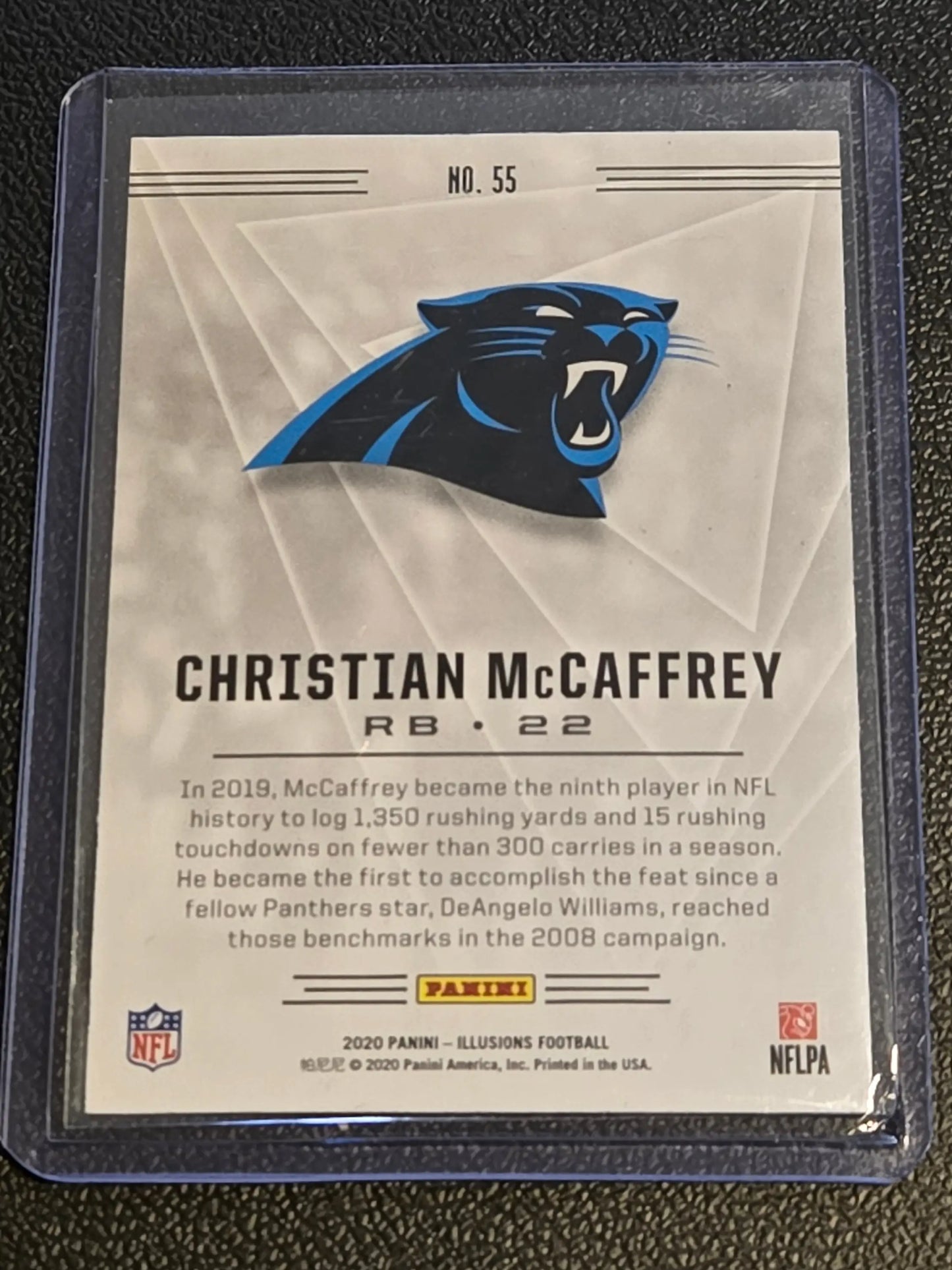 Christian McCaffrey football card from 2020 Panini Illusions product