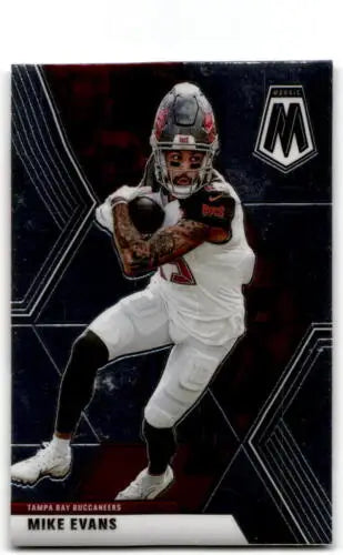 Football player in white uniform catching a football, showcasing Panini Mosaic Mike Evans
