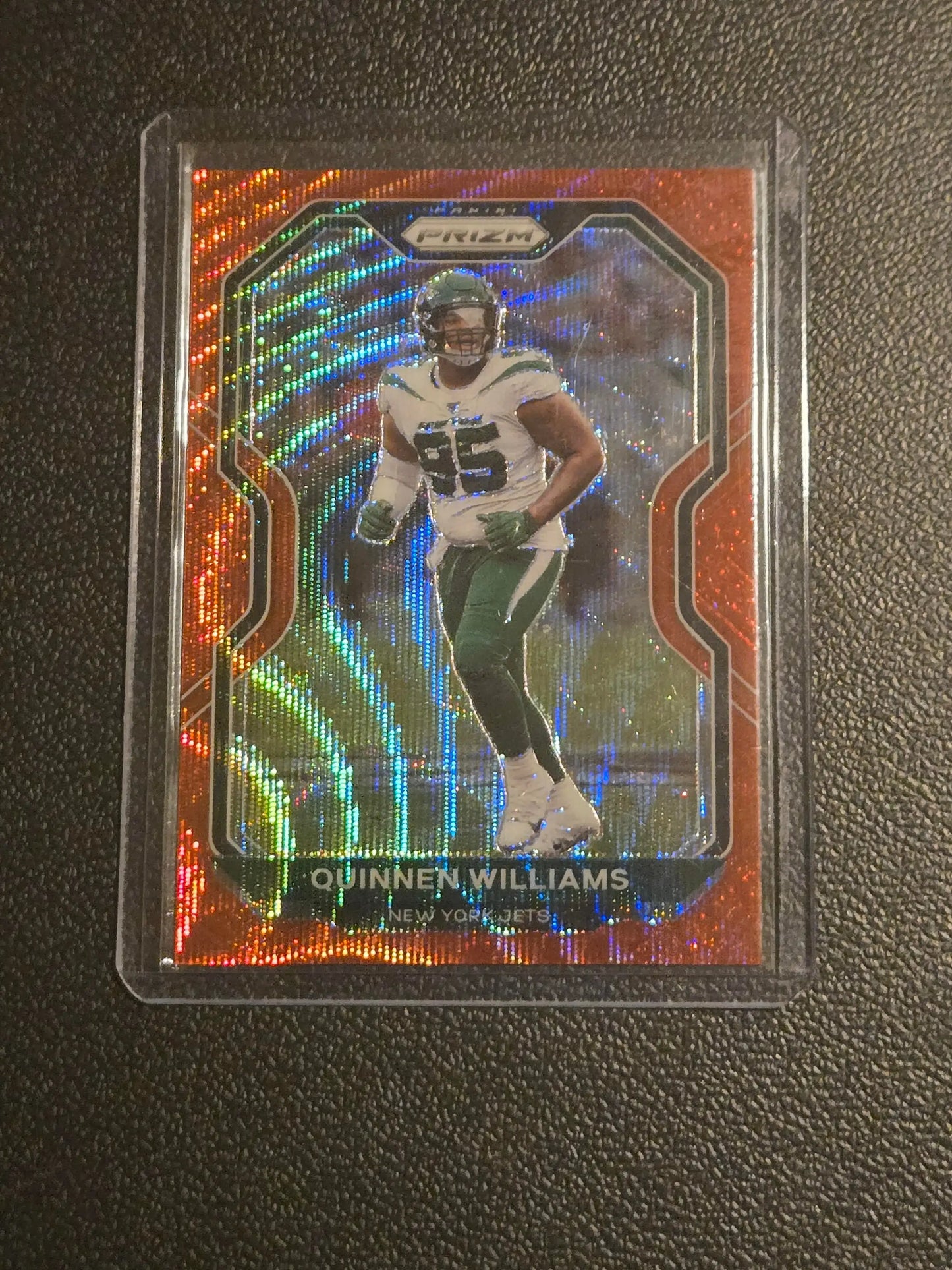 Quinnen Williams Prizm Red Wave football card from 2020 Panini Prizm series