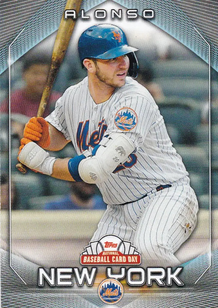 Baseball card of Pete Alonso in white uniform from Topps National Baseball Card Day