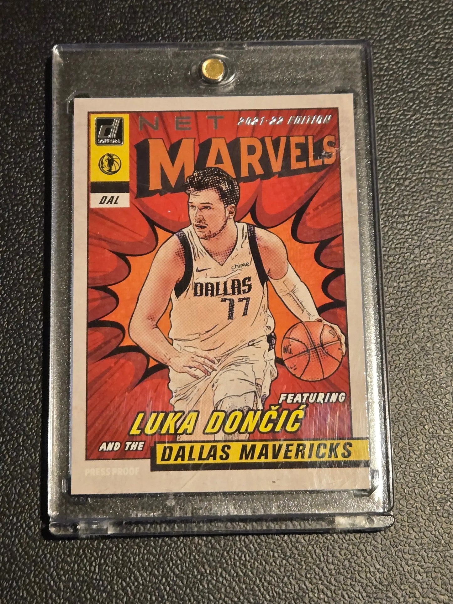 Luka Doncic NBA trading card in protective case from 2021-22 Donruss Luka Doncic Net Marvels