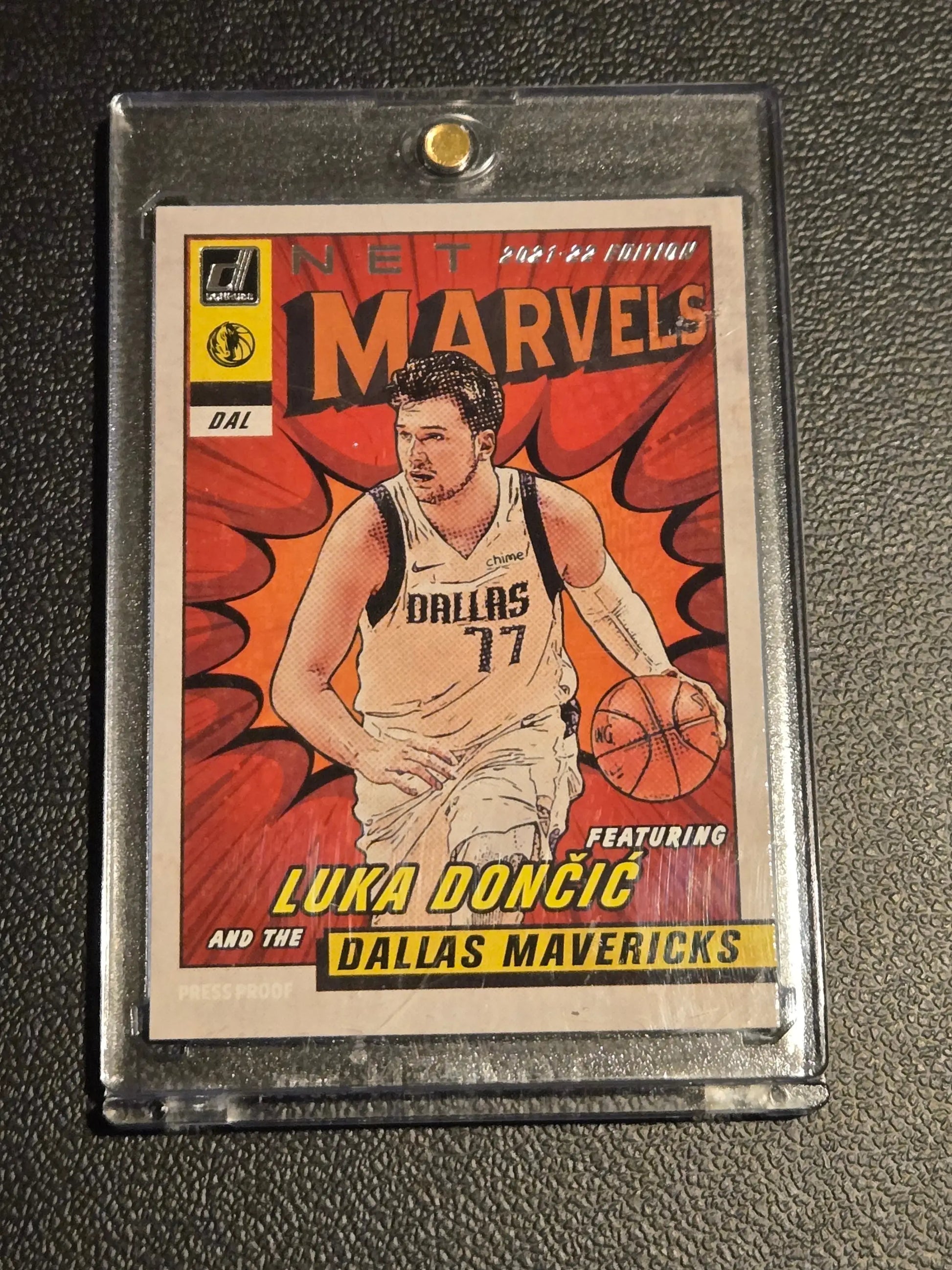 Luka Doncic NBA trading card in protective case from 2021-22 Donruss Luka Doncic Net Marvels