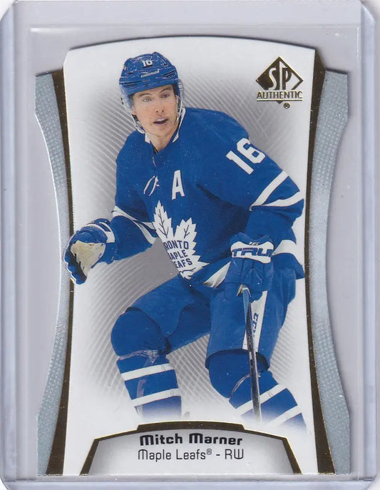 Hockey trading card of diecut DC8 Mitch Marner in Toronto Maple Leafs blue jersey