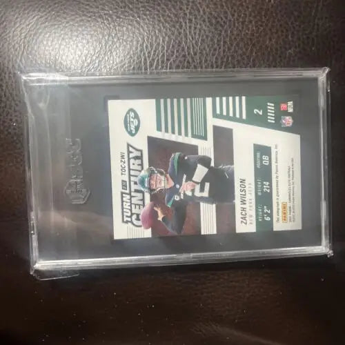 Graded Zach Wilson football card from Panini Chronicles Century Red Auto /75 SGC 10/9.5