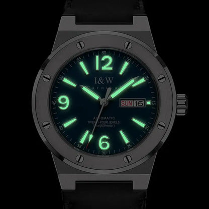 Glowing dark blue dial Swiss I&W mechanical watch with grey metal case and black leather band