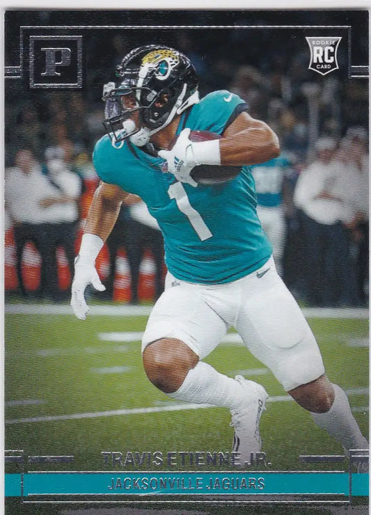 Football player in teal jersey running with the ball, Travis Etienne, Jacksonville Jaguars