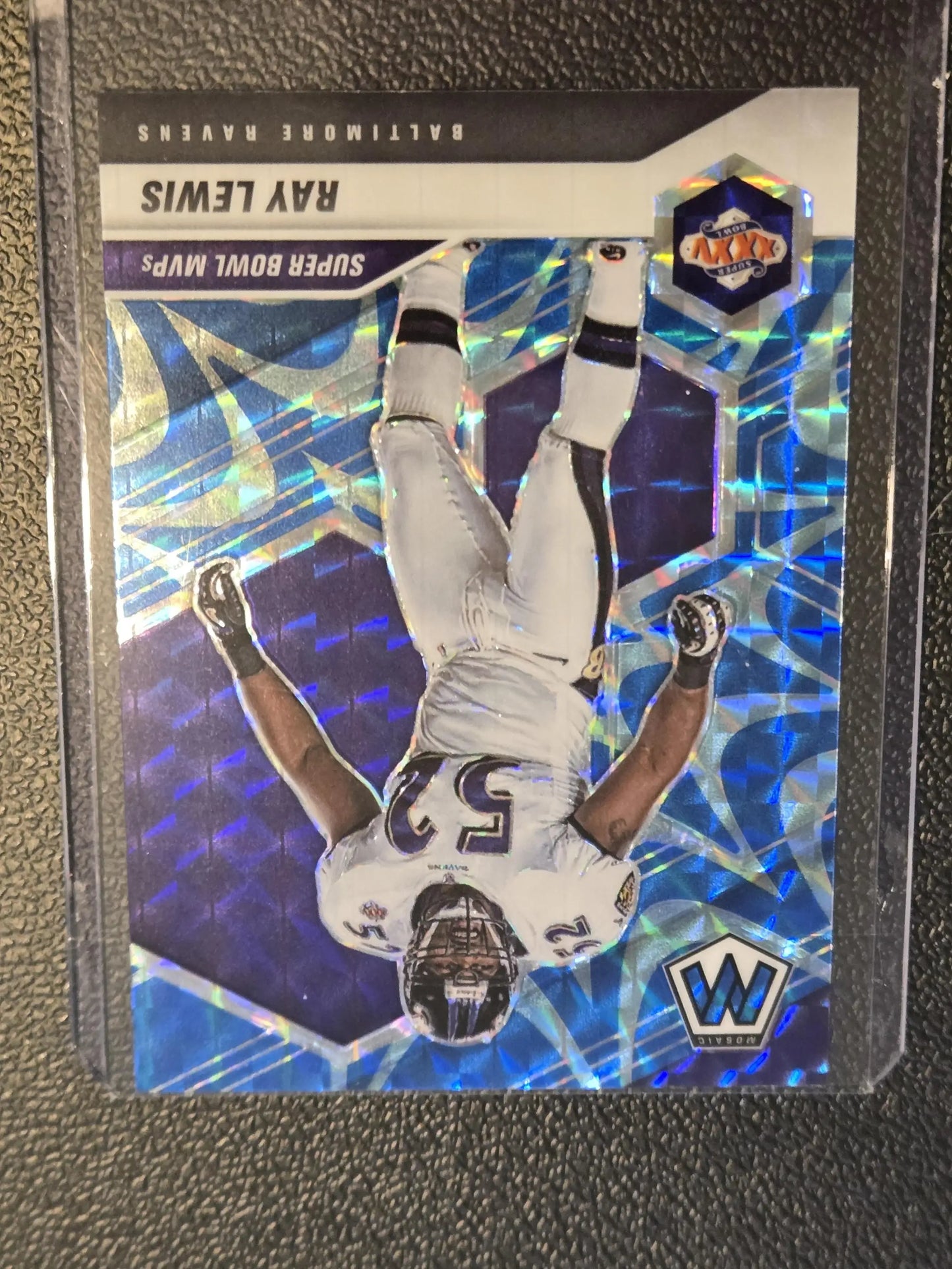 Purple and blue Ray Lewis Prizm Reactive football trading card from 2021 Panini Mosaic