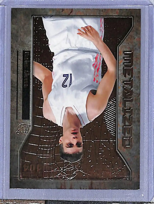 Basketball player Carlos Alocen upside down in 2021 Metal Universe Champions card