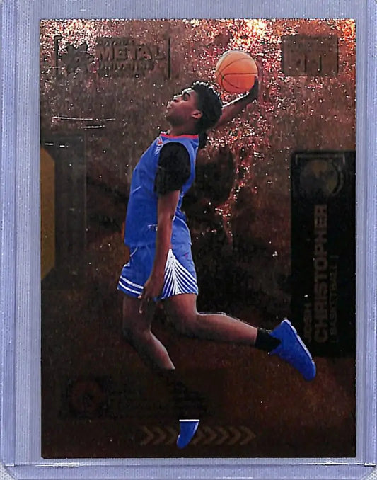 Josh Christopher soaring for a dunk in a blue uniform, Skybox Metal Universe Champions card