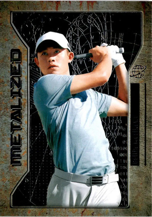 Collin Morikawa mid-swing in white cap and blue shirt on Skybox Metal Universe card