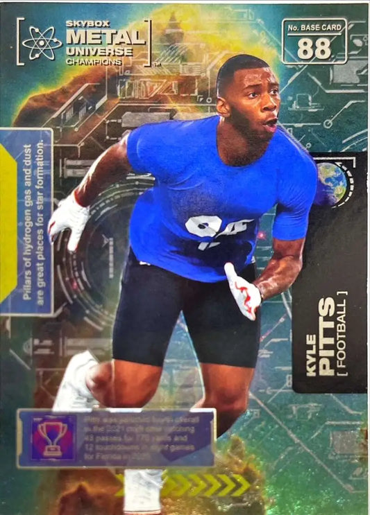 Football player in blue shirt ready for action on 2021 Skybox Metal Universe Kyle Pitts card