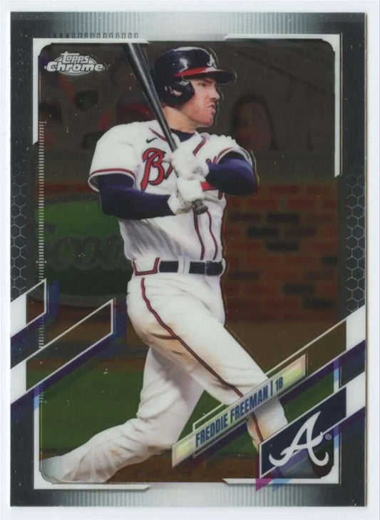 Freddie Freeman swinging in Atlanta Braves uniform on 2021 Topps Chrome baseball card