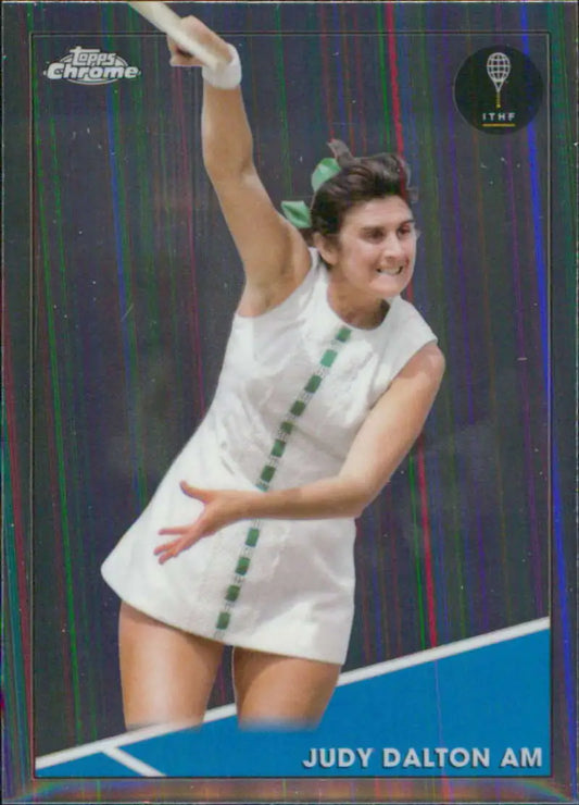 Judy Dalton in a white dress serving during a match on Topps Chrome Tennis Card