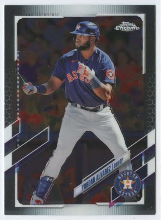 Baseball card of Yordan Alvarez in batting stance wearing a blue jersey from Topps Chrome