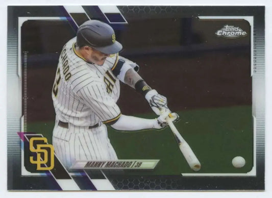 Manny Machado swinging bat in San Diego Padres pinstripe uniform during game