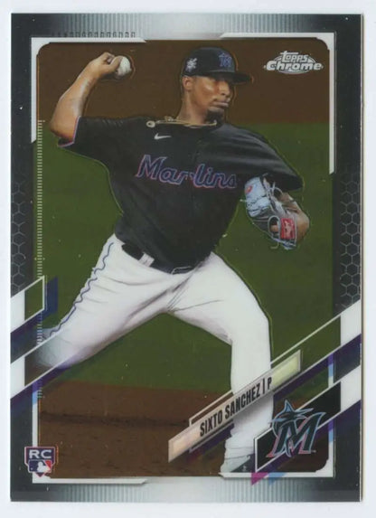 Sixto Sanchez pitching in a black jersey on a 2021 Topps Chrome baseball card