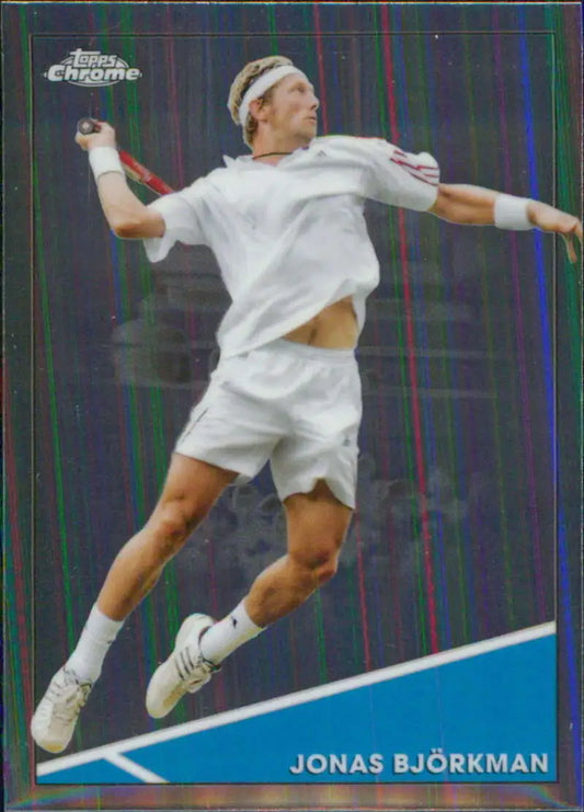 Jonas Bjorkman leaps in mid-air in all-white attire on Topps Chrome Tennis Card