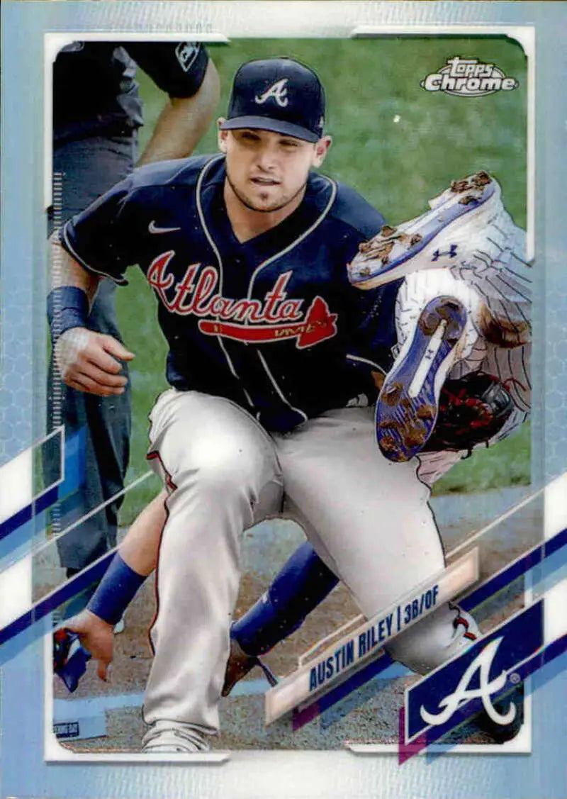 Austin Riley fielding a ground ball in Atlanta Braves navy uniform Topps Chrome baseball card