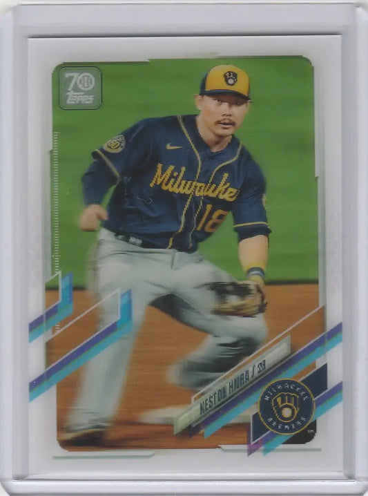 Baseball card of Keston Hiura fielding a ground ball for the Milwaukee Brewers