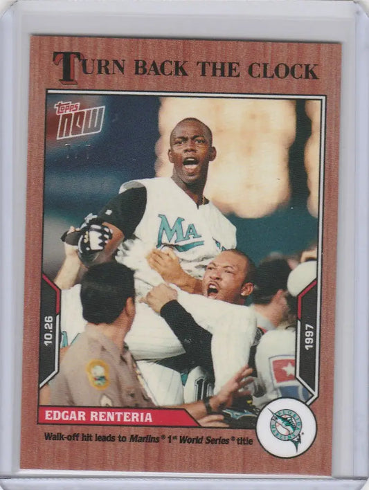 Baseball card of Edgar Renteria Marlins celebrating, Topps Turn Back Cherry Parallel