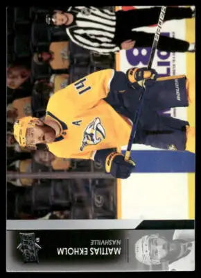 Yellow and navy blue hockey jersey with saber-toothed tiger logo from 2021 Upper Deck Mattias Ekholm #102