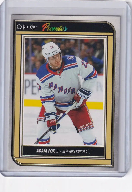 Hockey trading card of Adam Fox in action for New York Rangers OPC Hockey Premier