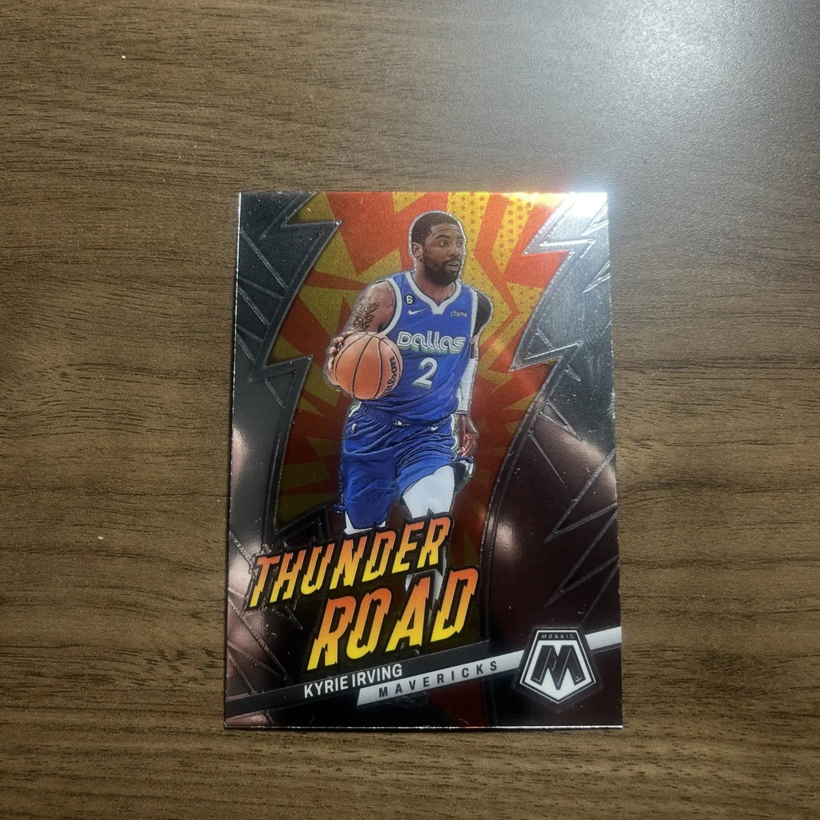 Kyrie Irving Mavericks card from 2022-23 Panini Mosaic Basketball Thunder Road #19