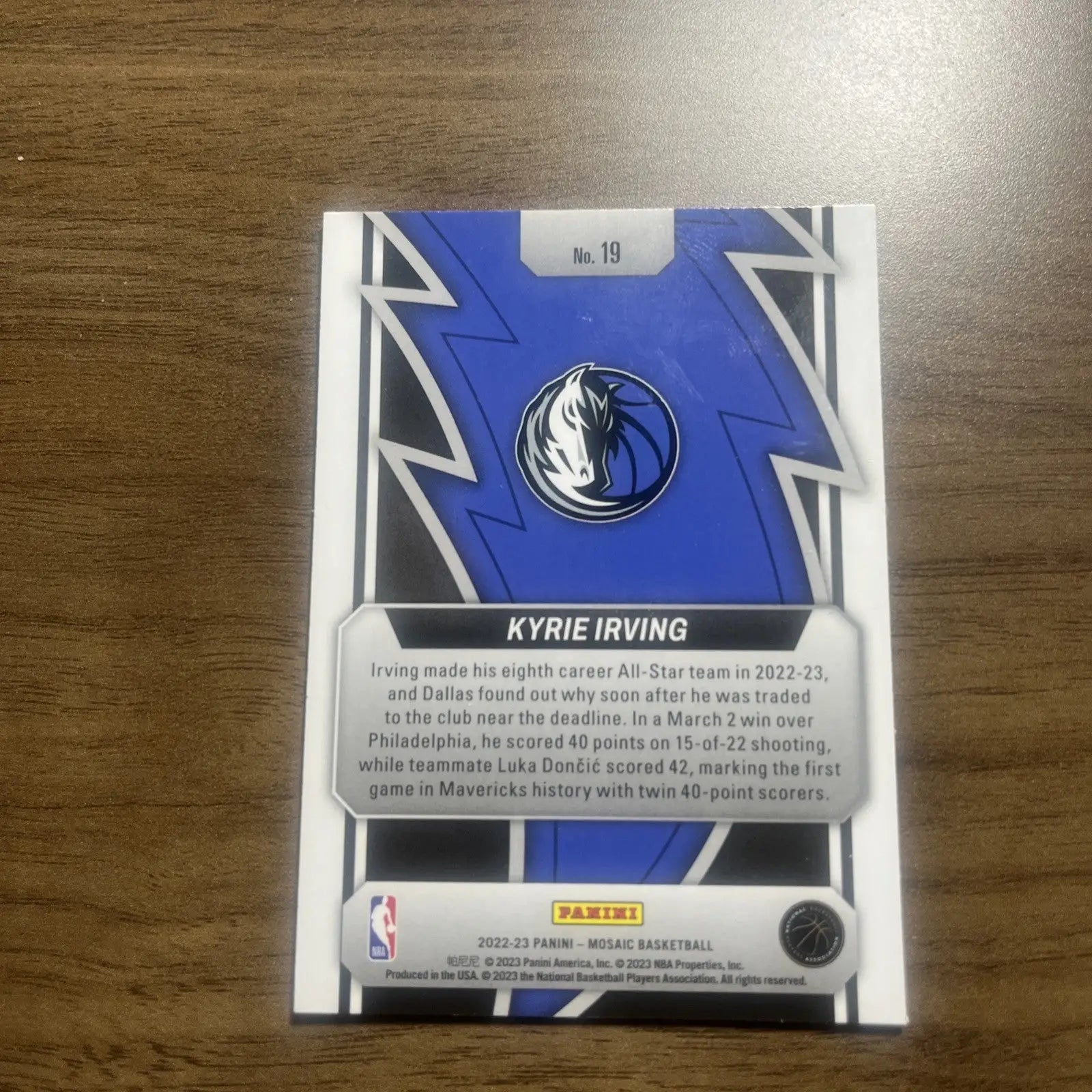 Kyrie Irving basketball card from 2022-23 Panini Mosaic Thunder Road #19