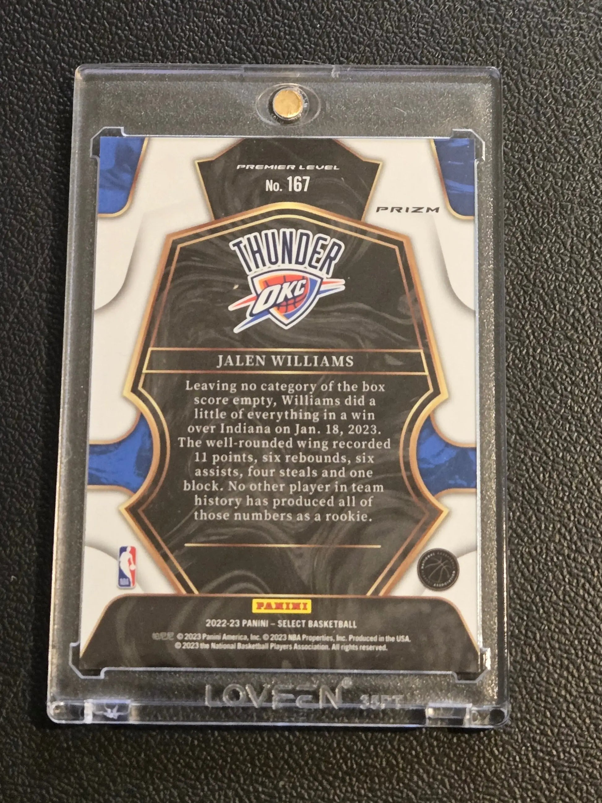 Jalen Williams rookie basketball card in protective case from 2022-23 Panini Select Williams Green White Purple Prizms