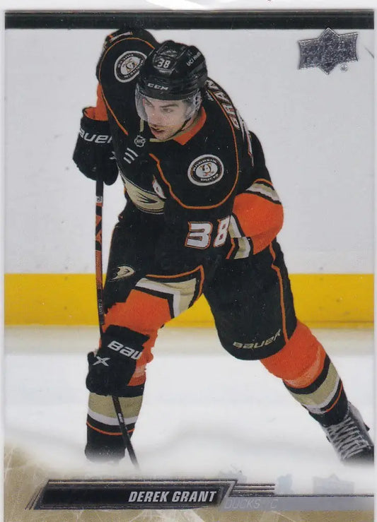 Hockey player Derek Grant skating on ice in Clear Anaheim Ducks uniform